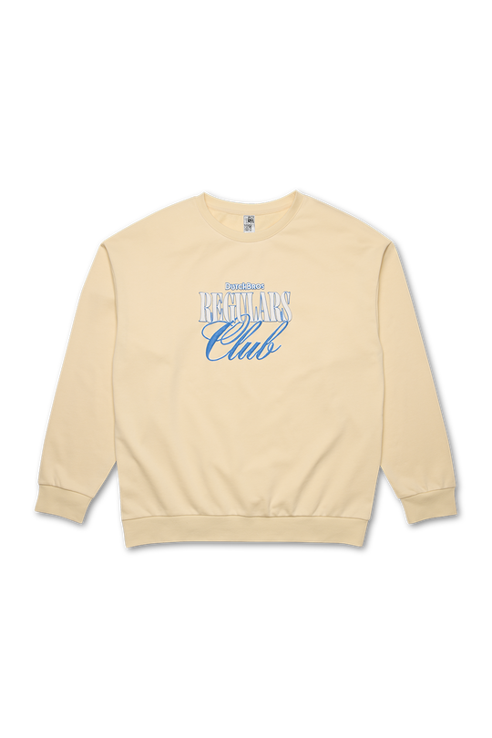 An off-white crewneck sweatshirt with 'Dutch Bros Regulars Club' printed in blue on the front.