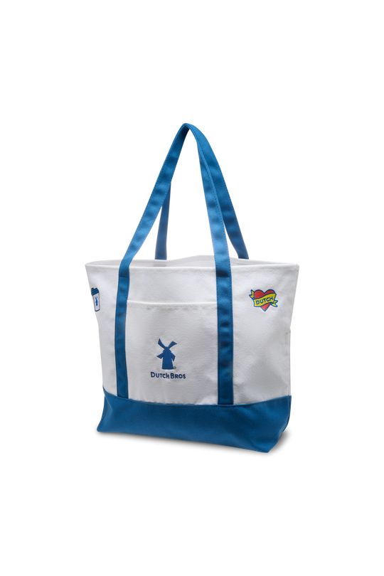 White tote bag with blue handles and bottom, featuring a logo and text on a white background