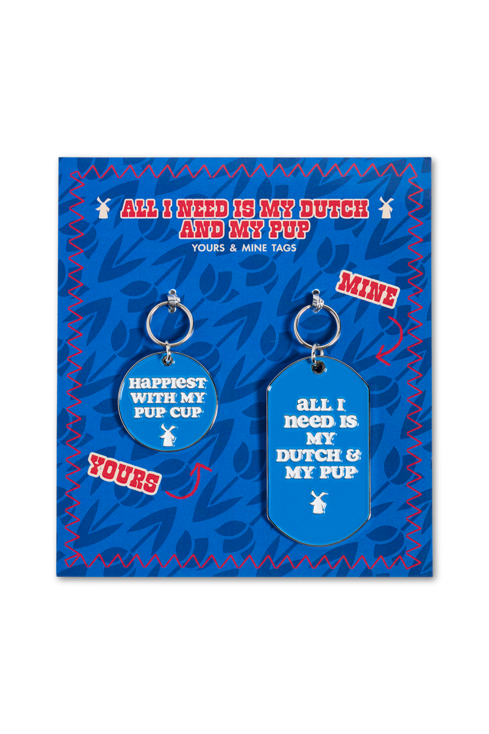 A pair of blue novelty keychains with white text and rabbit graphics, displayed on a blue and red card that reads 'ALL I NEED IS MY DUTCH AND MY PUP' on one and "happiest with my pup cup" on the other with labels 'MINE' and 'YOURS'. 