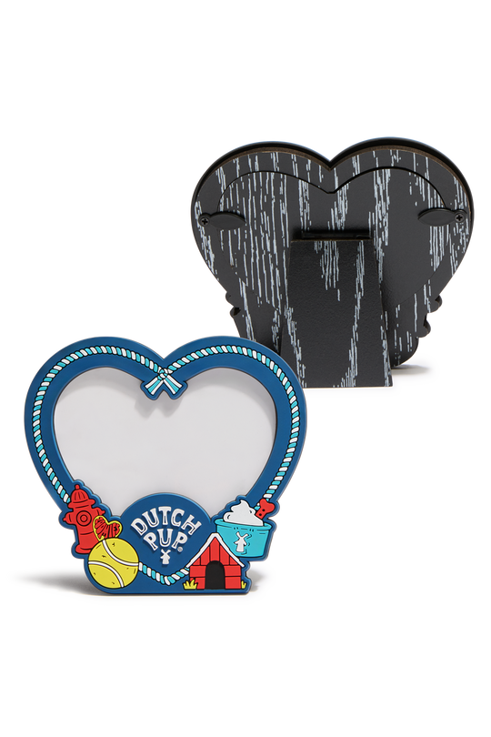 A heart-shaped Dutch Pup themed picture frame shown from the front and back. The front features a blue border with a rope pattern, a fire hydran, a yellow tennis ball, and a blue pup cup with the text 'DUTCH PUP'.
