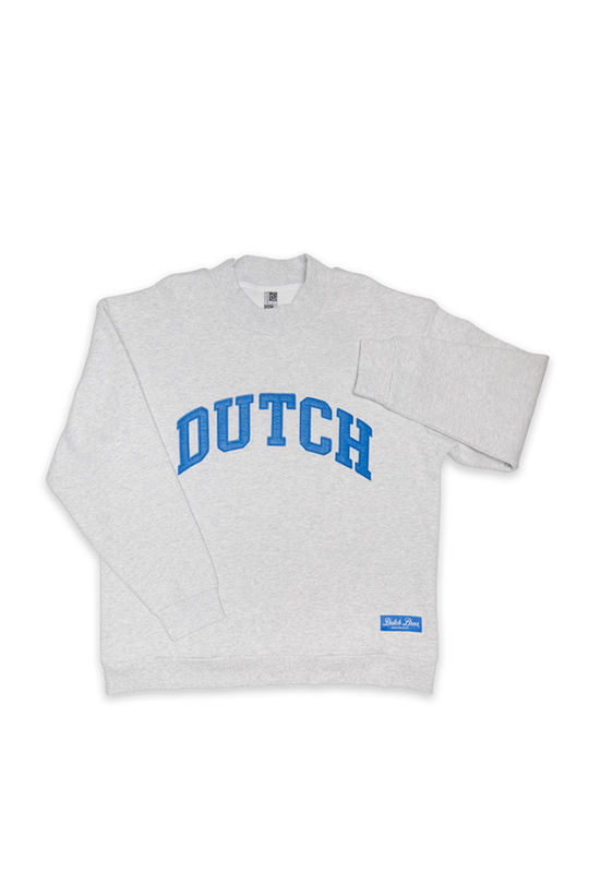 heather gray dutch mockneck with blue "DUTCH" stitching capitalized on the front with blue patch in the bottom left corner